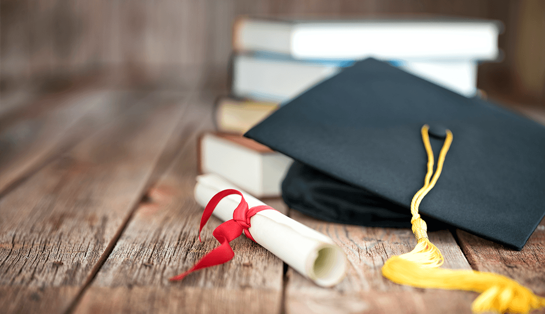 Graduation cap and scroll