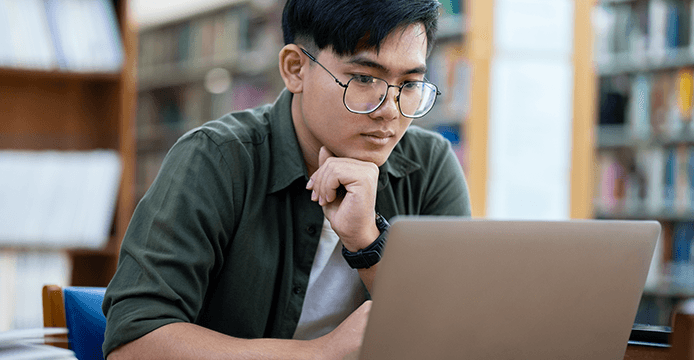 Woman studying on a laptop