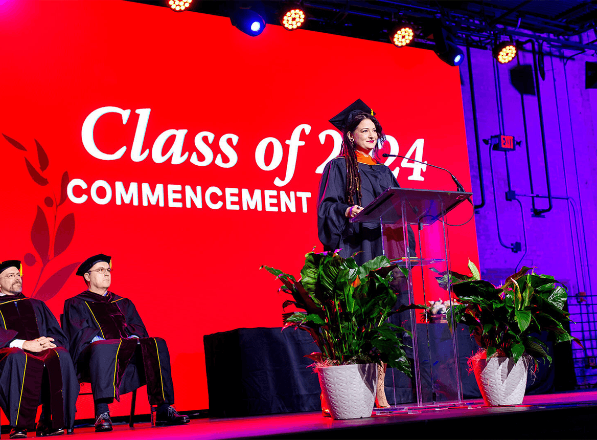 Woman Speaking at 2024 Graduation Ceremony