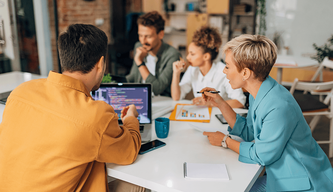 Coworkers Reviewing Data on a Computer in an Office